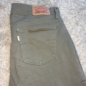 Army green Levi skinny jeans